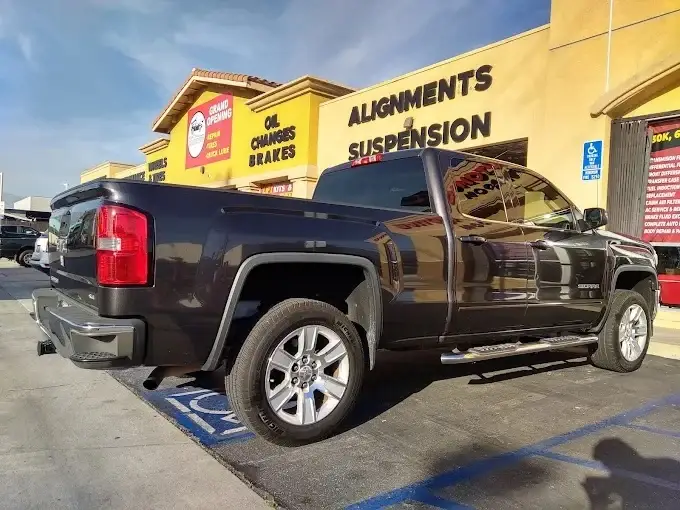 Pickup truck at the Velasco Auto Care Center repair shop